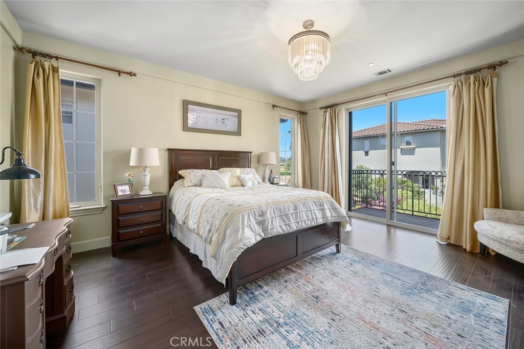 1602 Payton Way Nipomo, CA 93444 - Photo 21 of 71 a bedroom with a large bed and a window