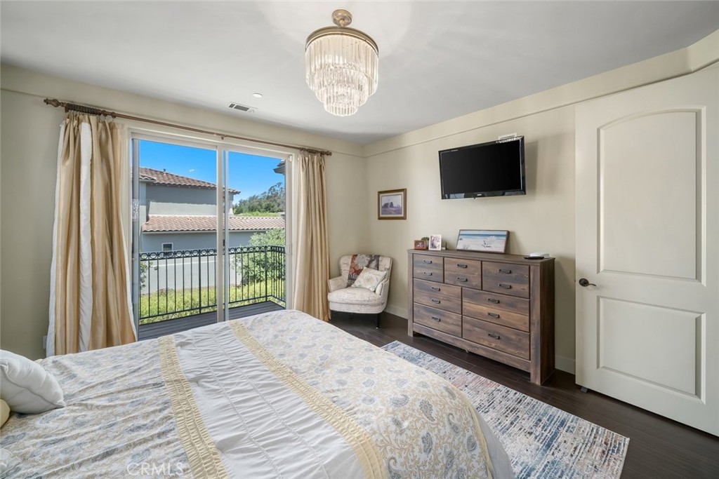 1602 Payton Way Nipomo, CA 93444 - Photo 22 of 71 a bedroom with a bed and a television