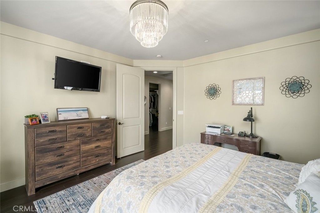 1602 Payton Way Nipomo, CA 93444 - Photo 26 of 71 a bedroom with a bed and flat screen tv