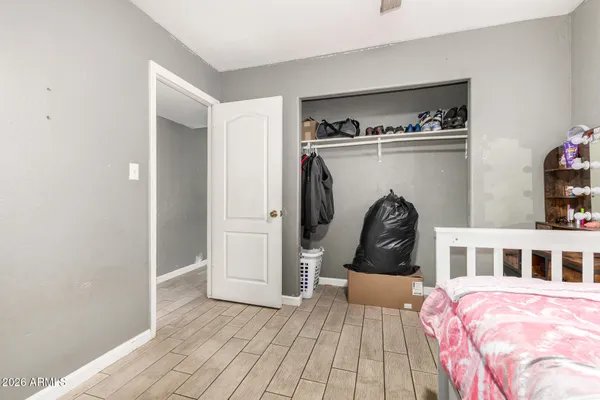 a living room with a bed and a couch