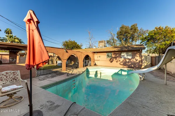swimming pool view with a outdoor space