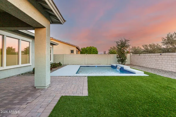 a view of a back yard of the house