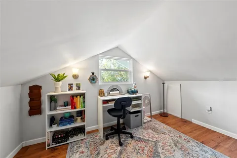 a workspace with furniture and window