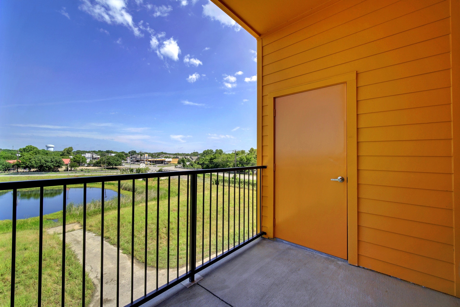13130 Pond Springs Road, Unit 3301 Austin, TX 78729 - Photo 23 of 26 Balcony featuring a water view