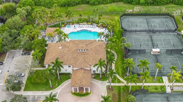 an aerial view of a house with a garden
