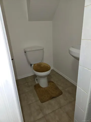 a bathroom with a toilet