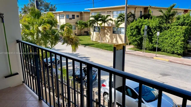 a view of a bench in a park