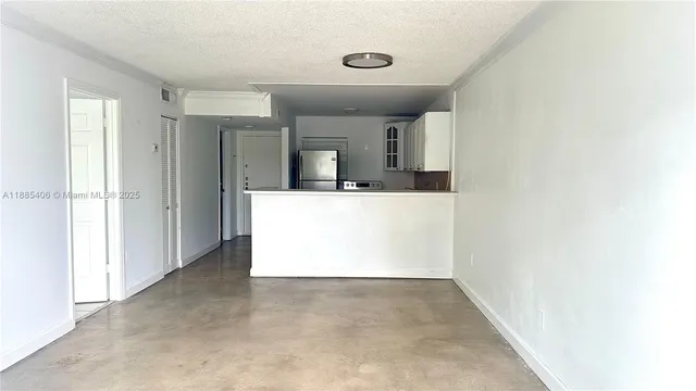 a view of a hallway to a room