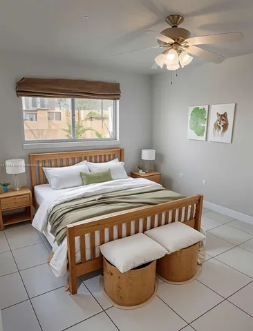 a bedroom with a bed and balcony