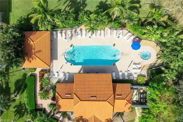 a view of swimming pool with a patio