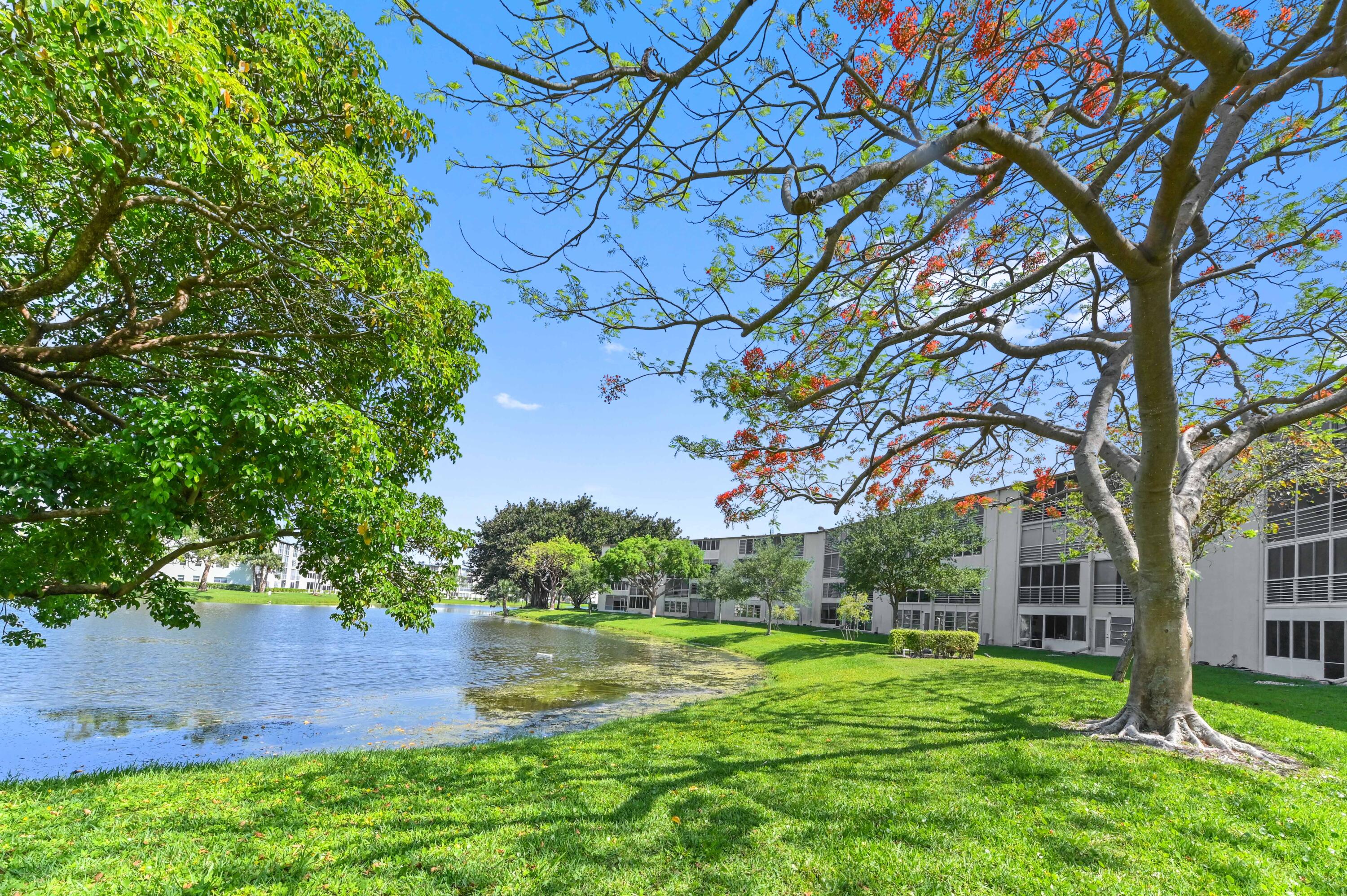 3046 Newcastle A Boca Raton, FL 33434 - Photo 25 of 25 a view of a backyard with large trees