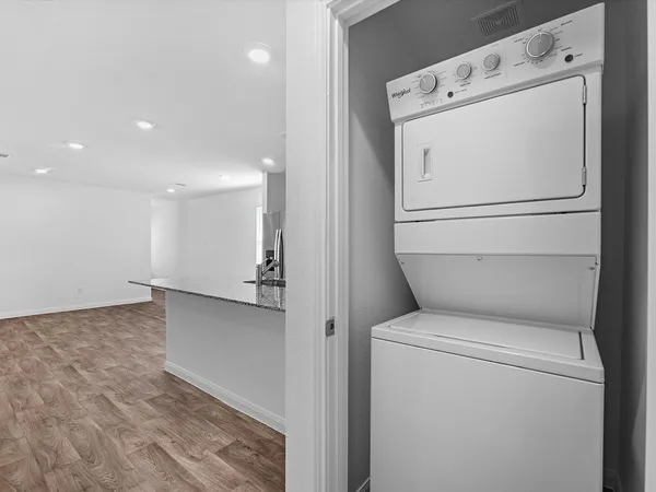 a view of storage and utility room with washer and dryer