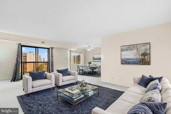 a living room with furniture and a couch