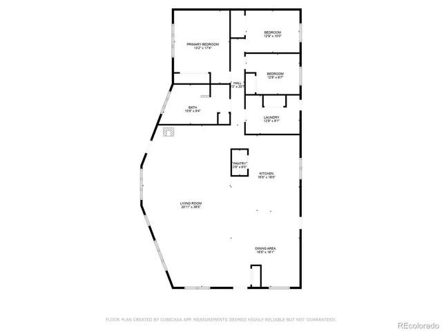 a dining room with furniture and a floor to ceiling window