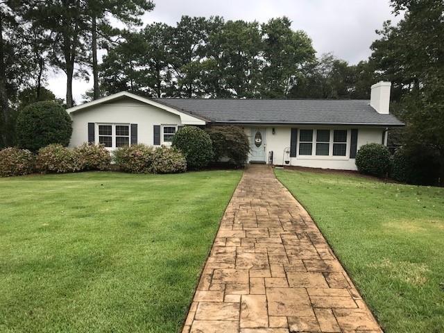 1 Forest Lane Rome, GA 30161 - Photo 1 of 1 a front view of a house with yard