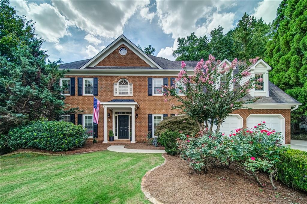 4060 Ridgehurst Drive Smyrna, GA 30080 - Photo 1 of 1 front view of a house with a yard