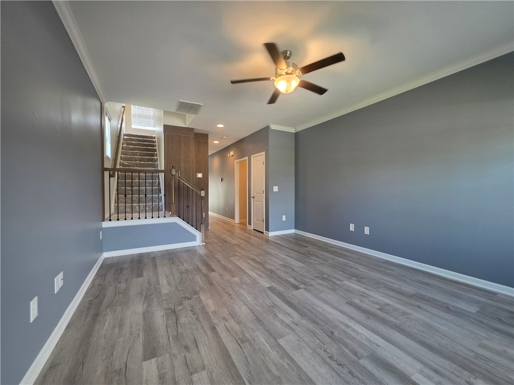 312 Phillips Drive Pendleton, SC 29670 - Photo 6 of 45 This expansive area features durable flooring, offering a versatile foundation for any interior design vision.