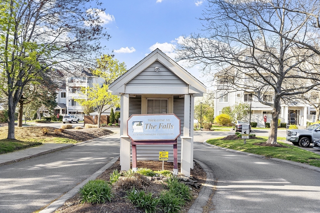 200 Falls Boulevard, Unit D108 Quincy, MA 02169 - Photo 25 of 30 a front view of a house with garden