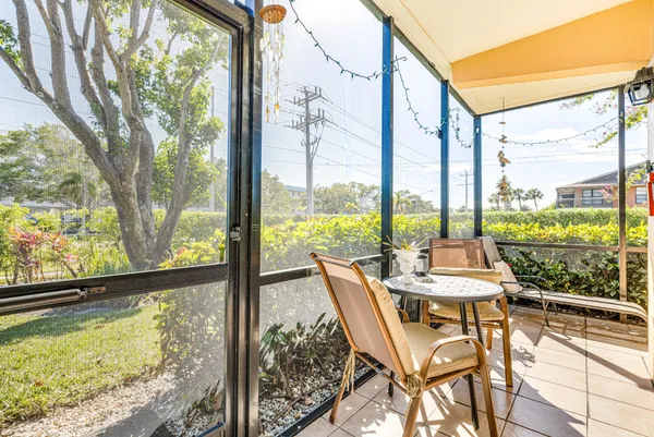a view of house with outdoor seating