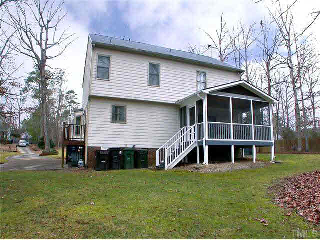 5403 Middleton Road Durham, NC 27713 - Photo 18 of 20 a view of a house with a yard