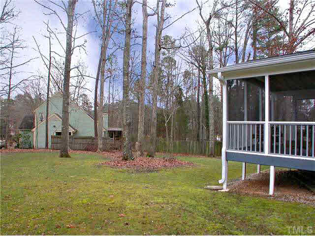 5403 Middleton Road Durham, NC 27713 - Photo 19 of 20 a view of a chair and table in backyard of the house