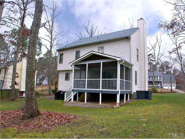 5403 Middleton Road Durham, NC 27713 - Photo 4 of 20 a view of a house with a yard and large trees