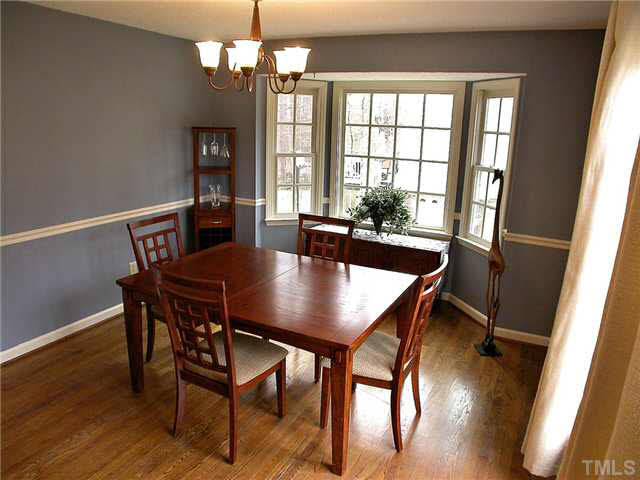 5403 Middleton Road Durham, NC 27713 - Photo 8 of 20 a view of a dining room with furniture window and wooden floor