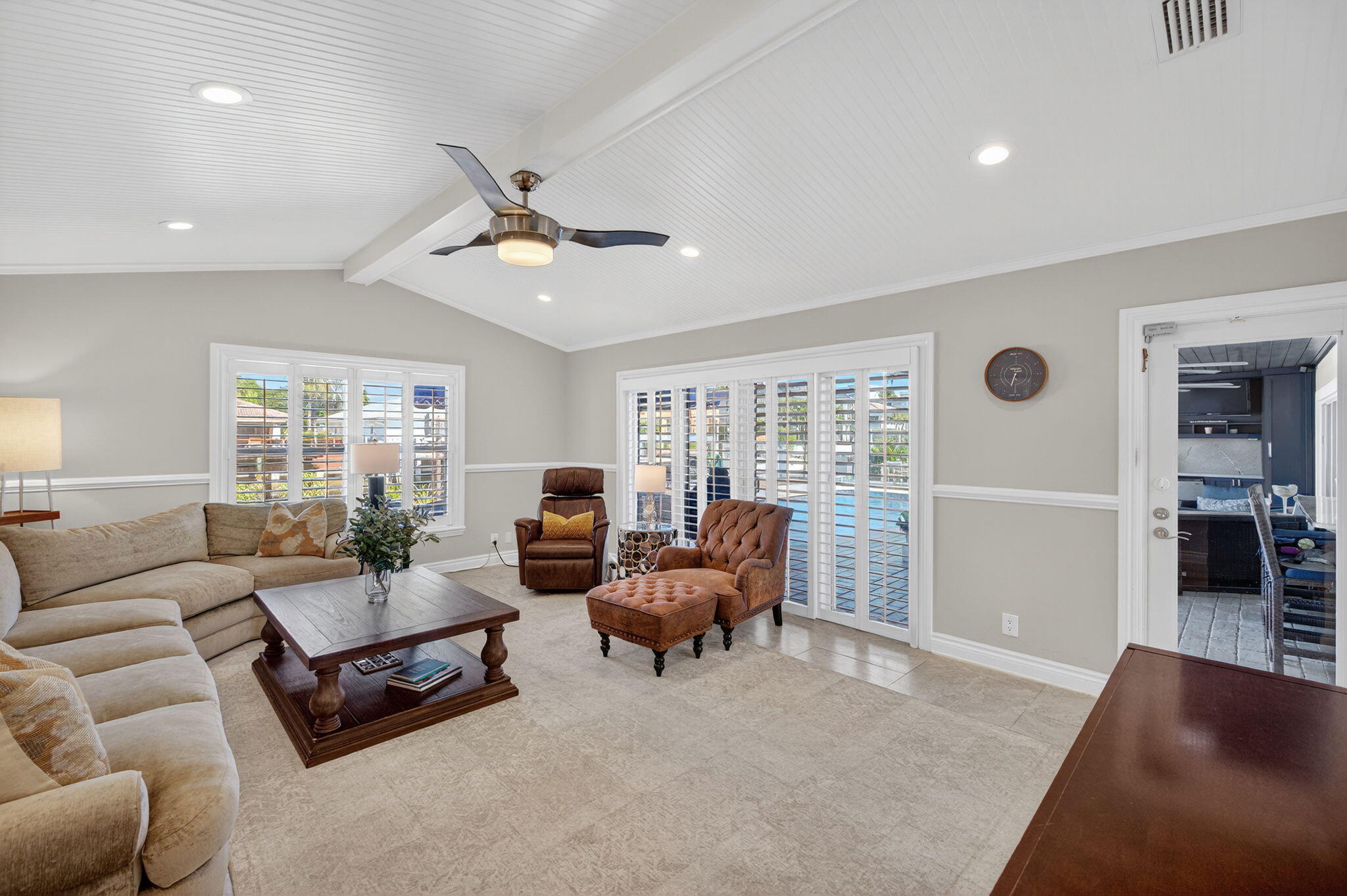 885 Nafa Drive Boca Raton, FL 33487 - Photo 26 of 66 a living room with furniture ceiling fan and a window