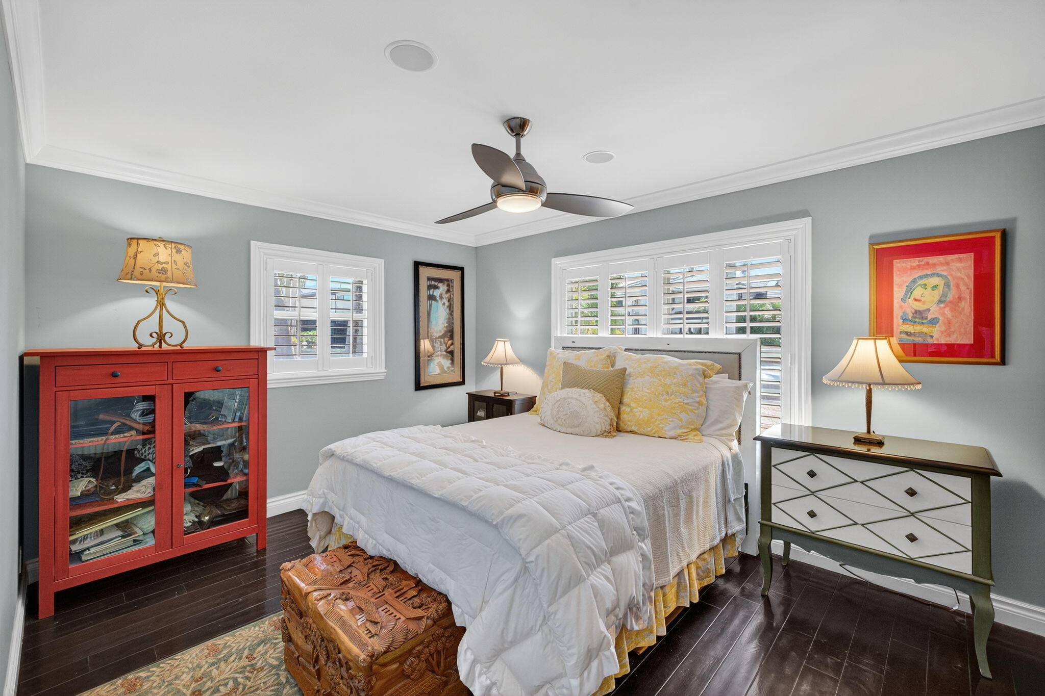 885 Nafa Drive Boca Raton, FL 33487 - Photo 37 of 66 a bedroom with a bed a dresser and painting on the wall