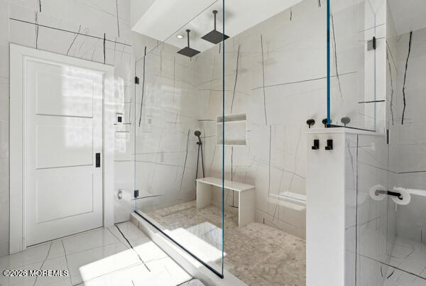 54 Georgetown Road Eatontown, NJ 07724 - Photo 11 of 24 a bathroom with a shower and a sink