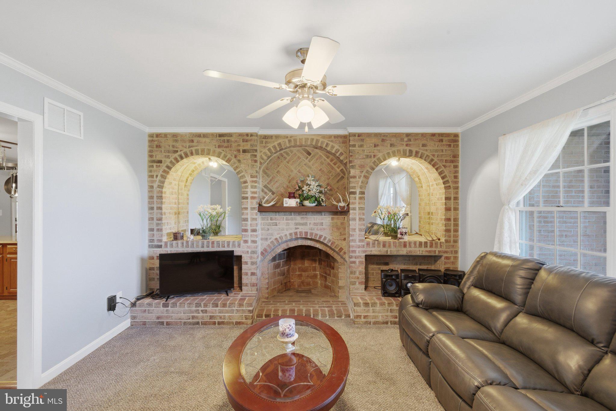 18310 Upper Beckleysville Road Hampstead, MD 21074 - Photo 15 of 67 Charming living space with brick accents.