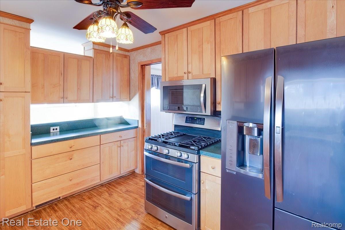 1730 Morley Avenue Rochester, MI 48307 - Photo 11 of 41 Kitchen w/ updated cabinets/ Newer premium appliances ( gas stove and convection microwave)