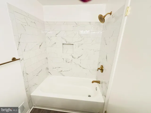 a view of a room with racks on the wall