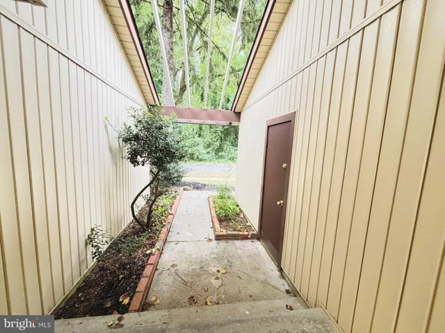 a view of backyard with green space