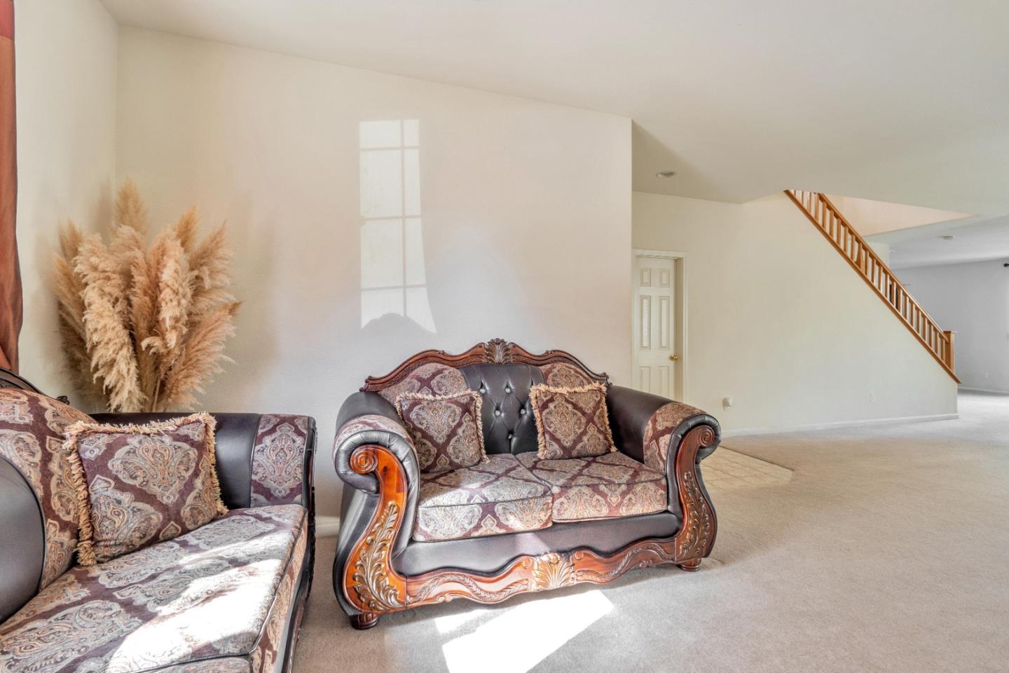 1433 Brahma Street Patterson, CA 95363 - Photo 11 of 43 a bedroom with bed and a couch