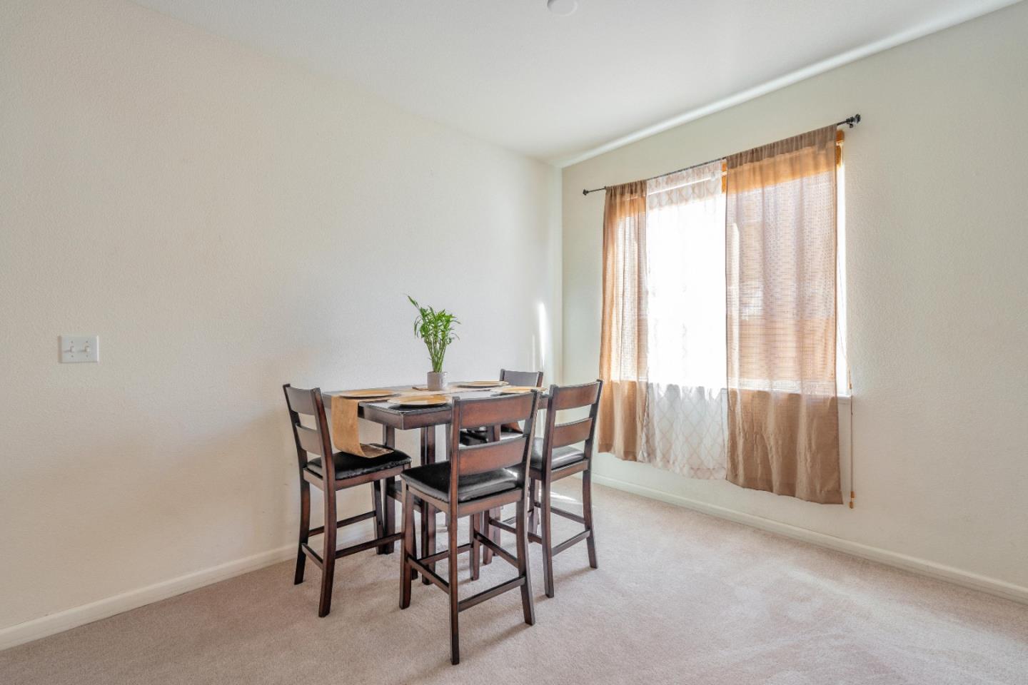 1433 Brahma Street Patterson, CA 95363 - Photo 18 of 43 a view of a dining room with furniture and a window