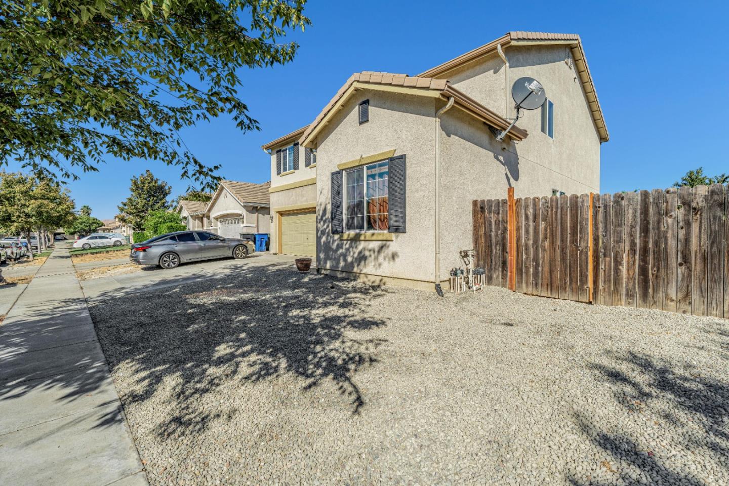 1433 Brahma Street Patterson, CA 95363 - Photo 2 of 43 a front view of a house with a yard