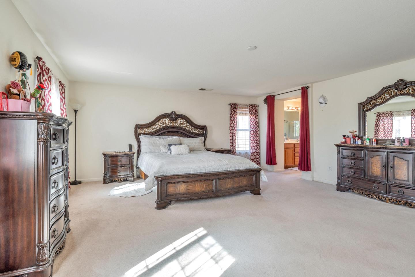 1433 Brahma Street Patterson, CA 95363 - Photo 25 of 43 a bedroom with furniture and a flat tv screen