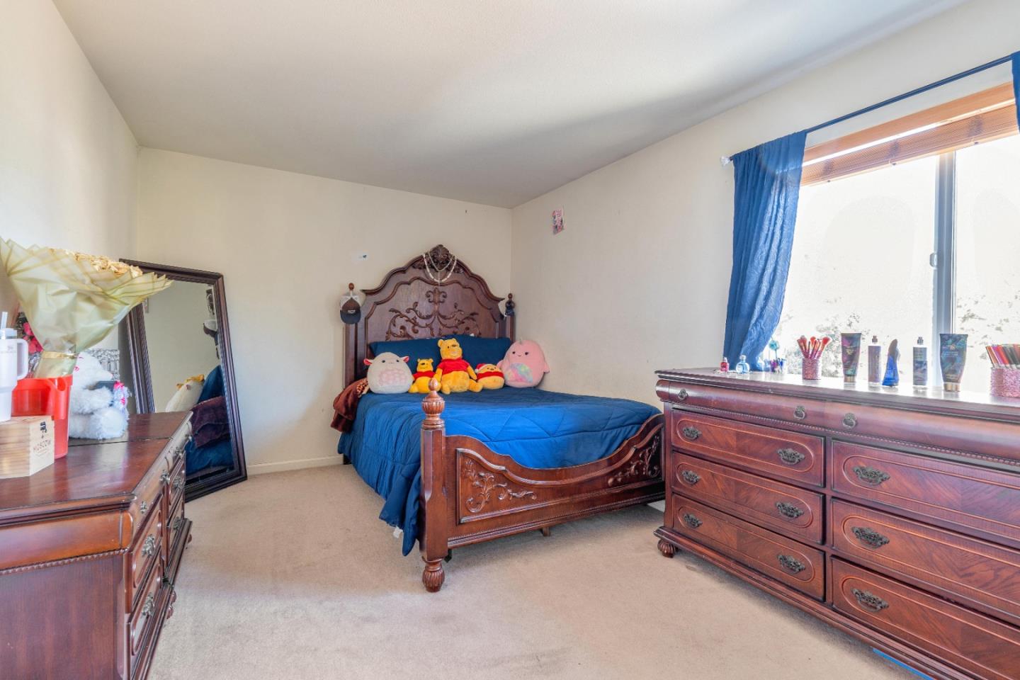 1433 Brahma Street Patterson, CA 95363 - Photo 31 of 43 a bed room with furniture and a window