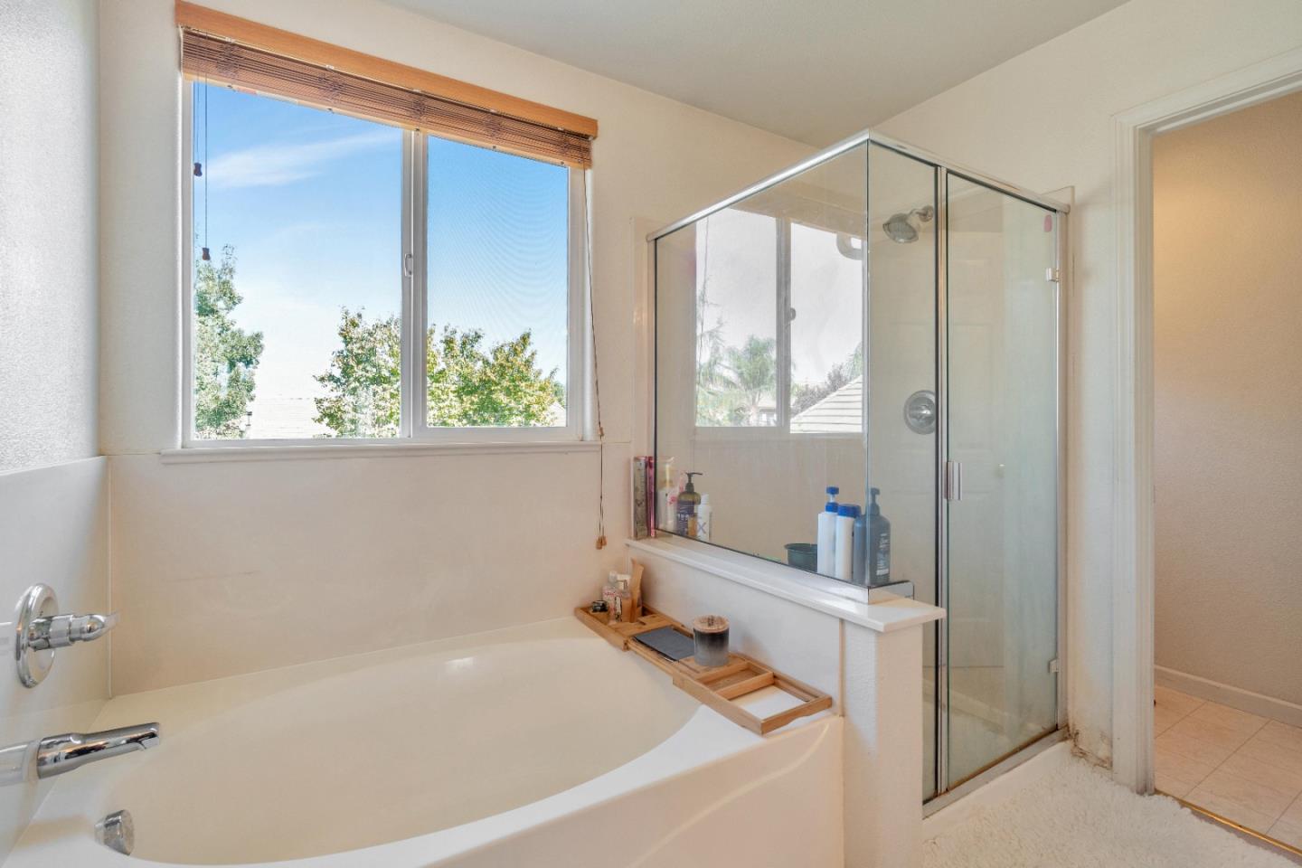 1433 Brahma Street Patterson, CA 95363 - Photo 37 of 43 a bathroom with a tub and a shower