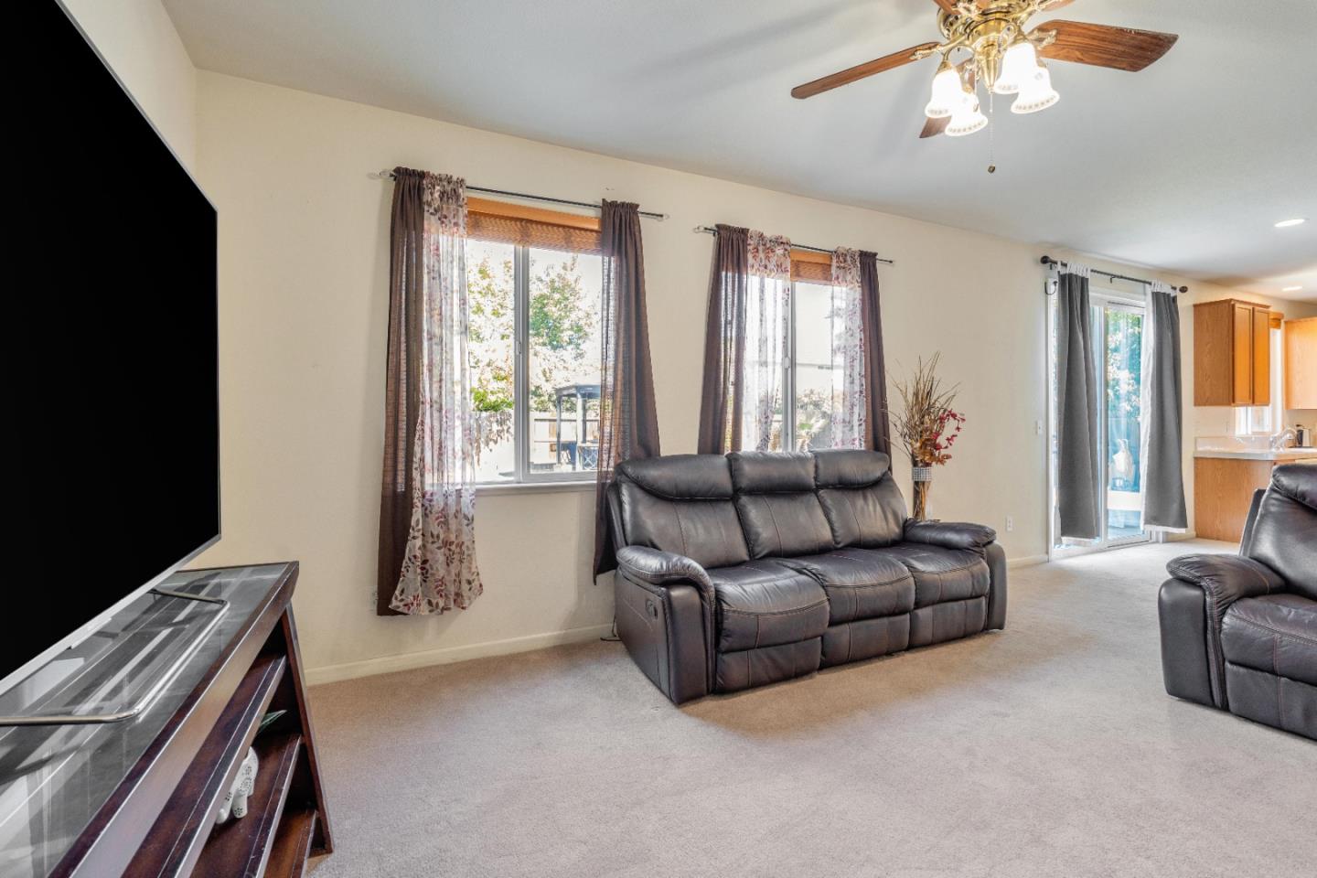 1433 Brahma Street Patterson, CA 95363 - Photo 7 of 43 a living room with furniture and a window