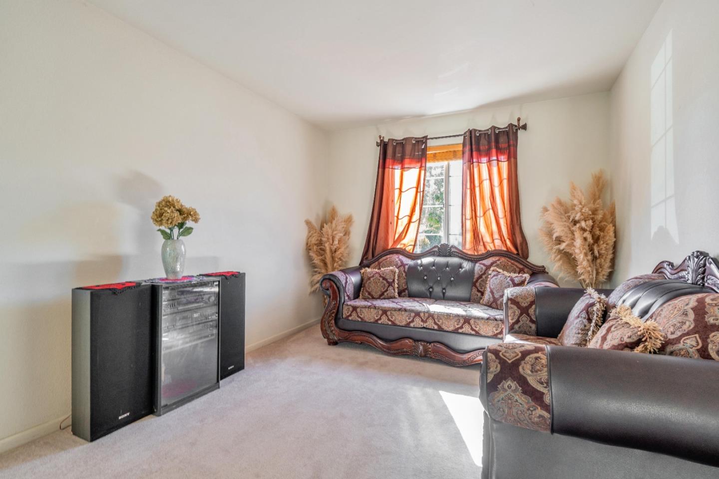1433 Brahma Street Patterson, CA 95363 - Photo 10 of 43 a living room with furniture and window