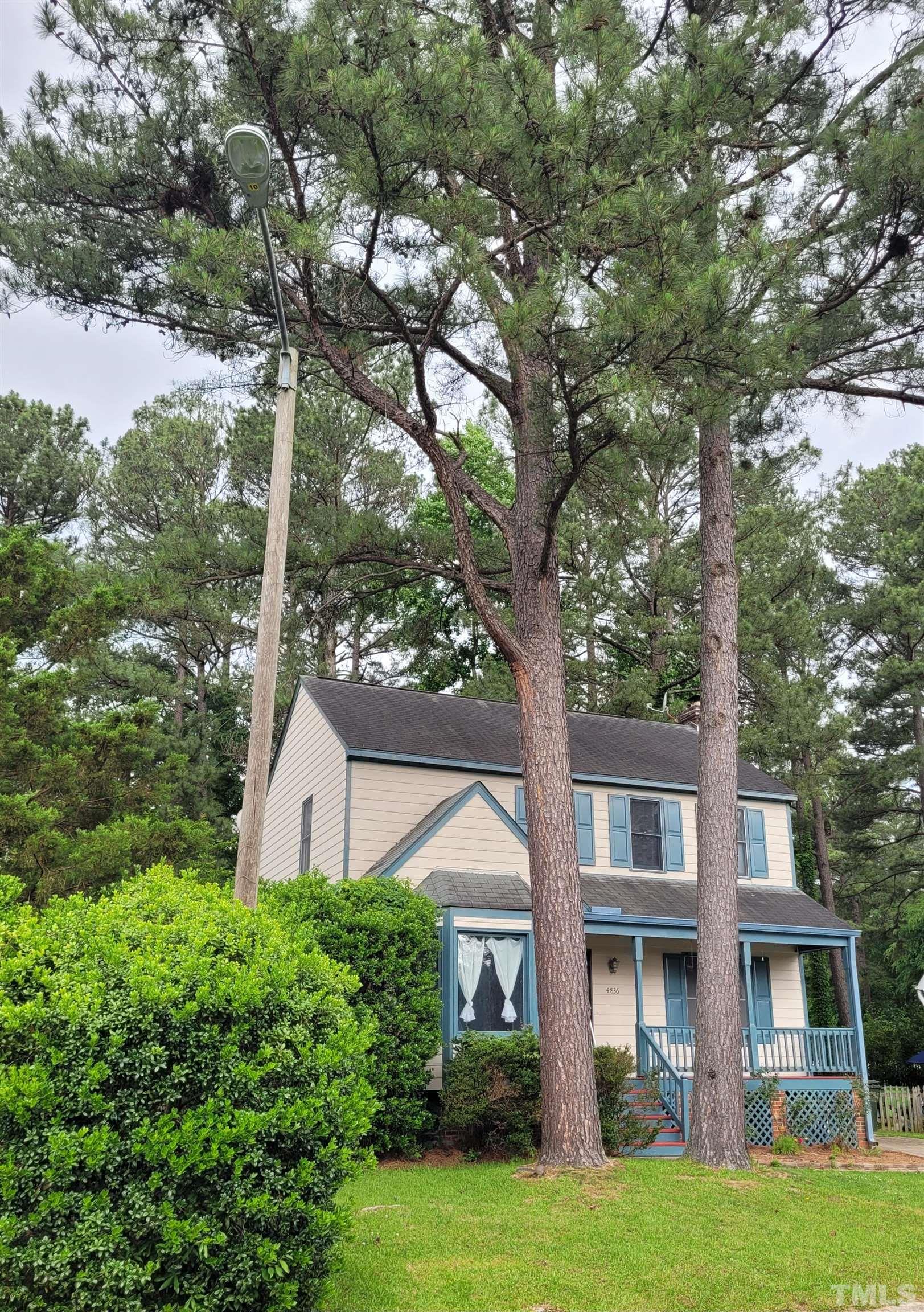 4836 Draper Road Raleigh, NC 27616 - Photo 2 of 16 a front view of a house with garden