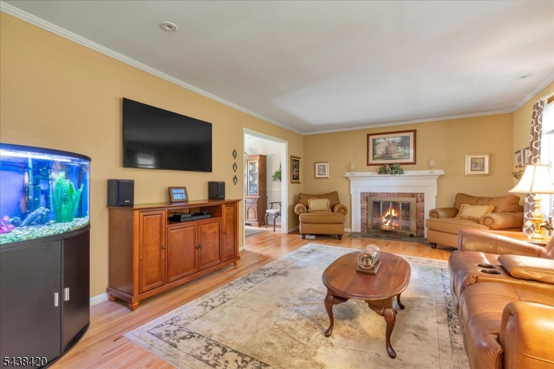 79 Main Street Califon, NJ 07830 - Photo 6 of 50 a living room with furniture and a flat screen tv
