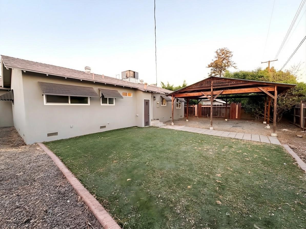 302 Sequoia Drive Exeter, CA 93221 - Photo 19 of 20 a view of a house with patio