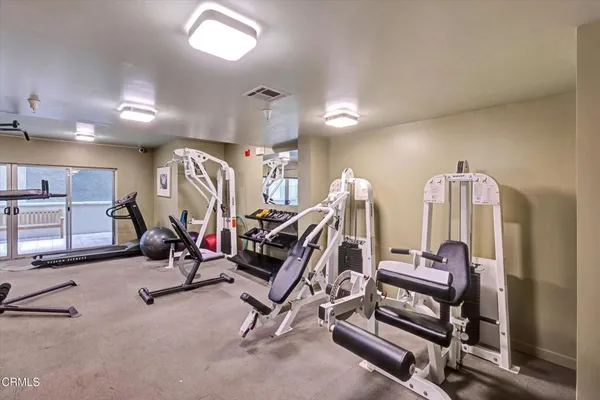 a view of a room with gym equipment