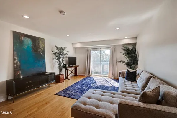 a living room with furniture and a couch