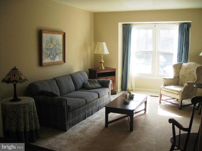 6278 Rathlin Drive Springfield, VA 22152 - Photo 15 of 25 a living room with furniture and a window