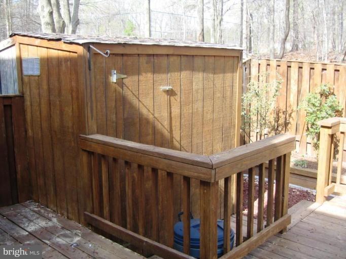 6278 Rathlin Drive Springfield, VA 22152 - Photo 22 of 25 a view of wooden balcony