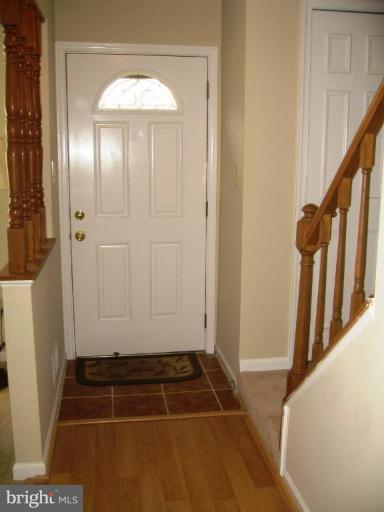 6278 Rathlin Drive Springfield, VA 22152 - Photo 9 of 25 a view of a door with wooden floor